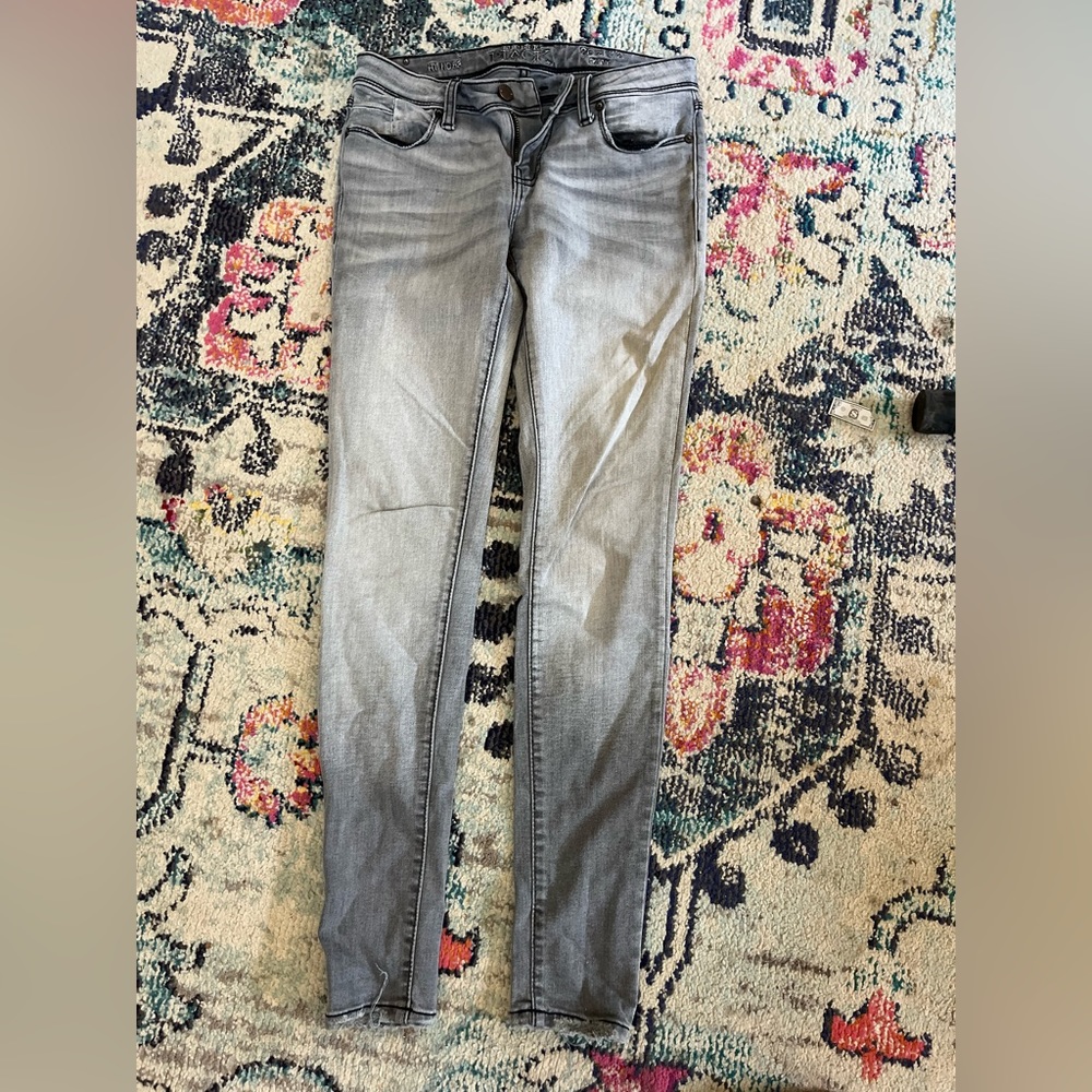 Buckle black skinny jeans size 26x32